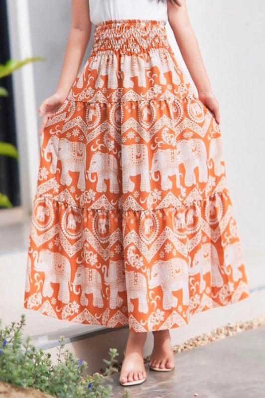 Jupe longue bohémienne à étages à taille smockée à prix grossiste - éléphant orange